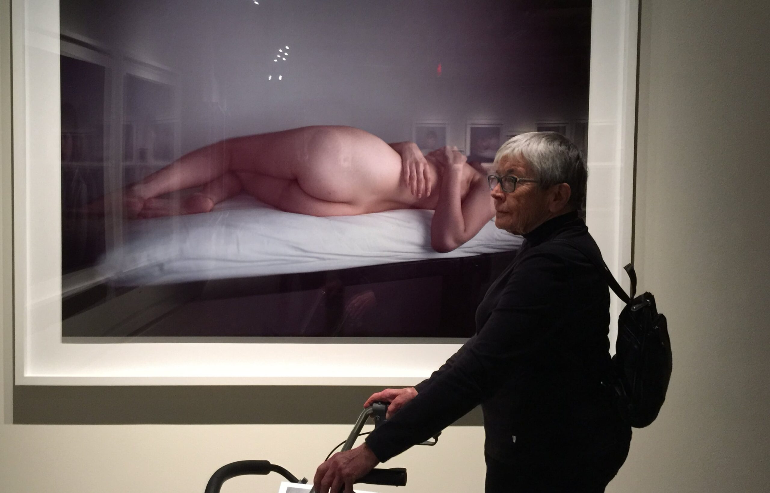 Diane Nanis admiring art